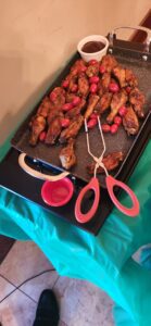 BBQ Party Wings with Tomatoes on a tray