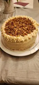 Butter Pecan Cake With Decoration on a White Color Plate